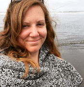 Dr. Fabienne Serriere standing by the beach